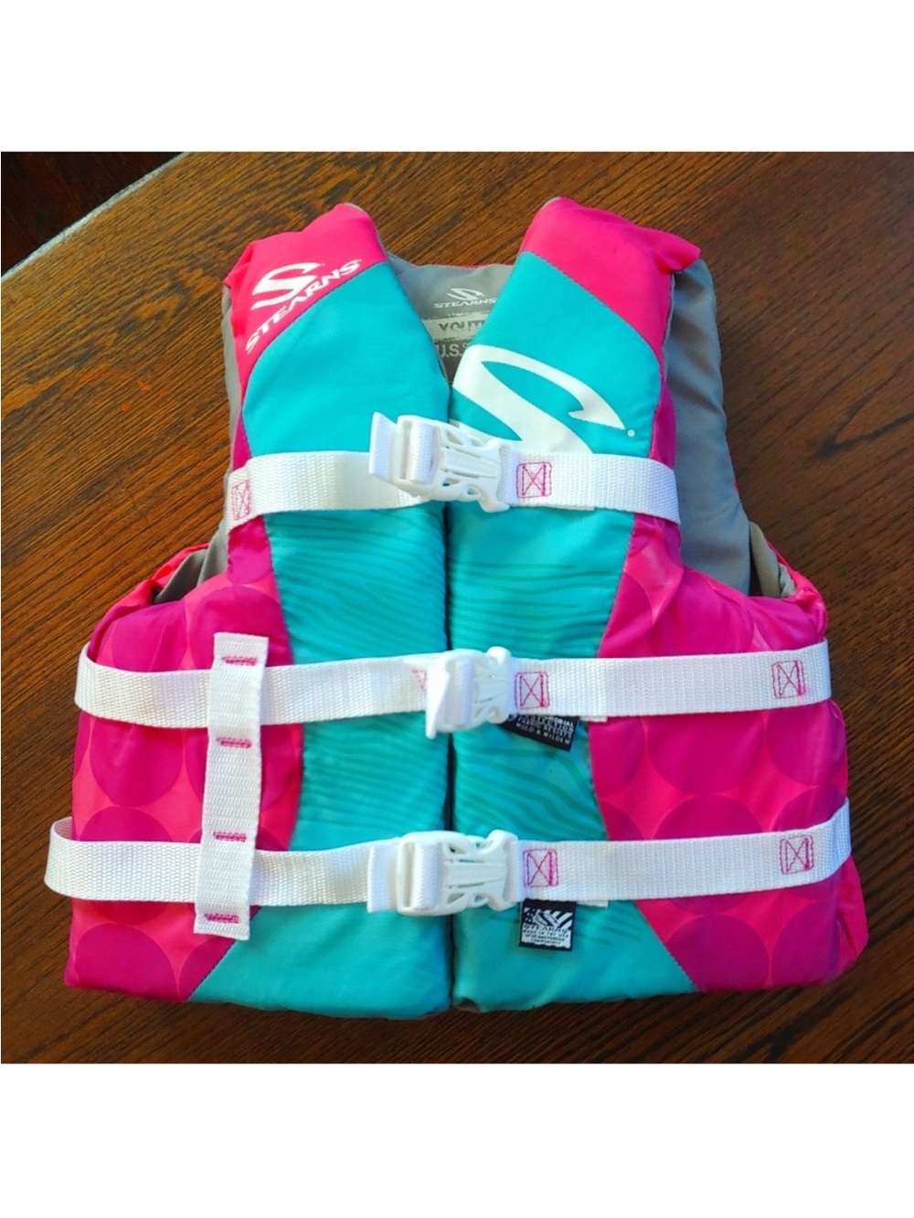 Stearns teal and pink youth ski vest size 50-90lbs